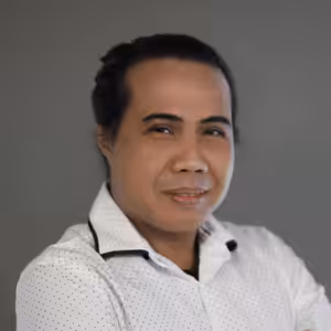 Professional headshot of Yassir Yahya, an independent consultant based in Kuala Lumpur.